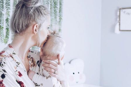 baby and Mom up early after early morning waking