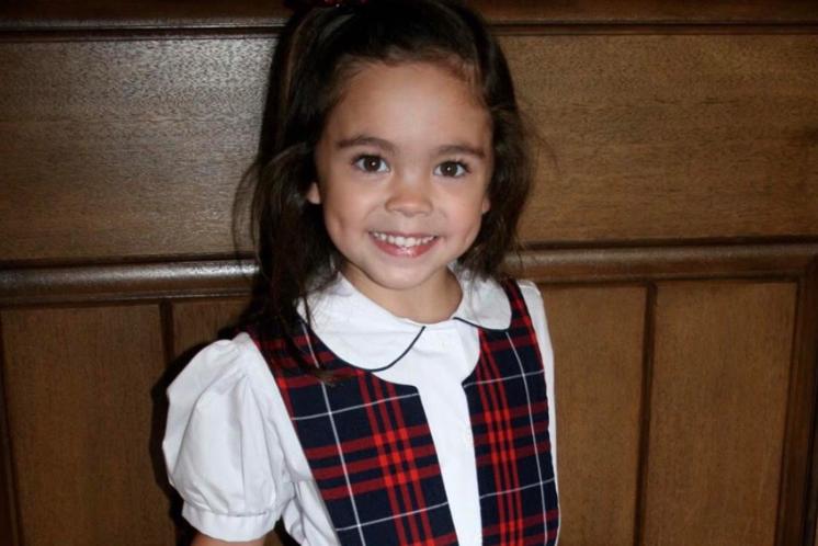 little girl in Kindergarten school uniform