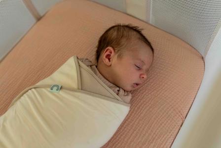 swaddled baby sleeping