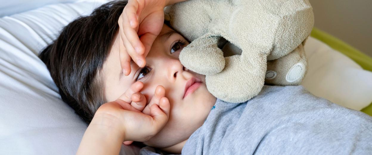Toddler laying awake in bed after waking up too early