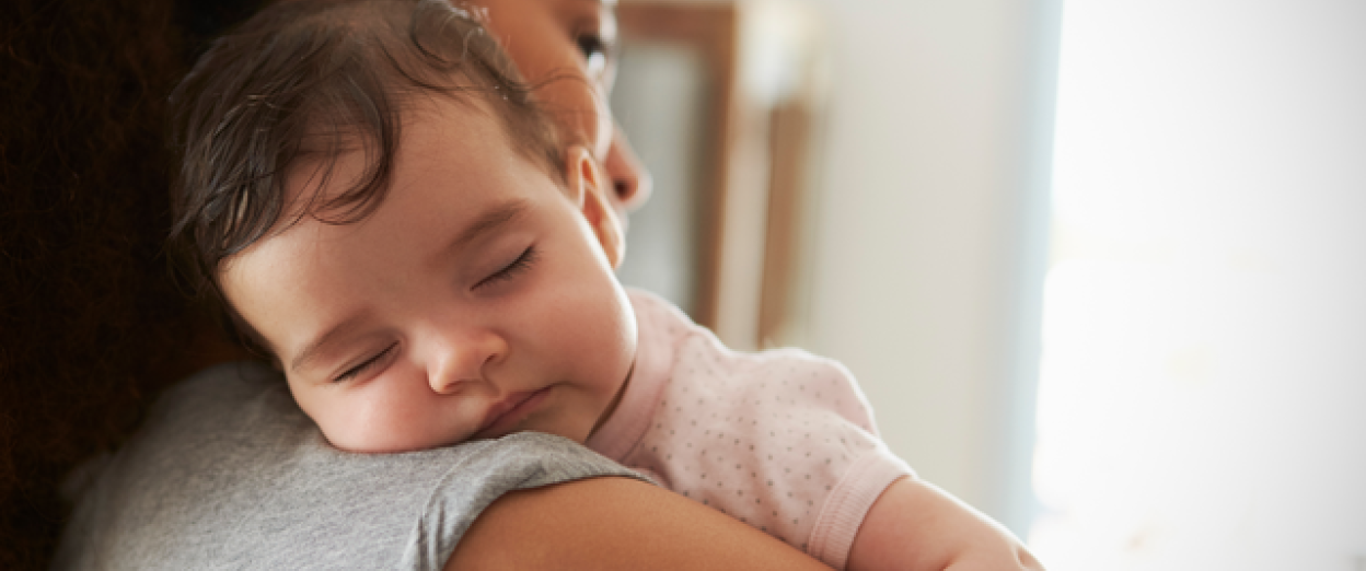 baby girl fell asleep on mom's shoulder during asleep regression