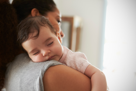 baby girl fell asleep on mom's shoulder during asleep regression